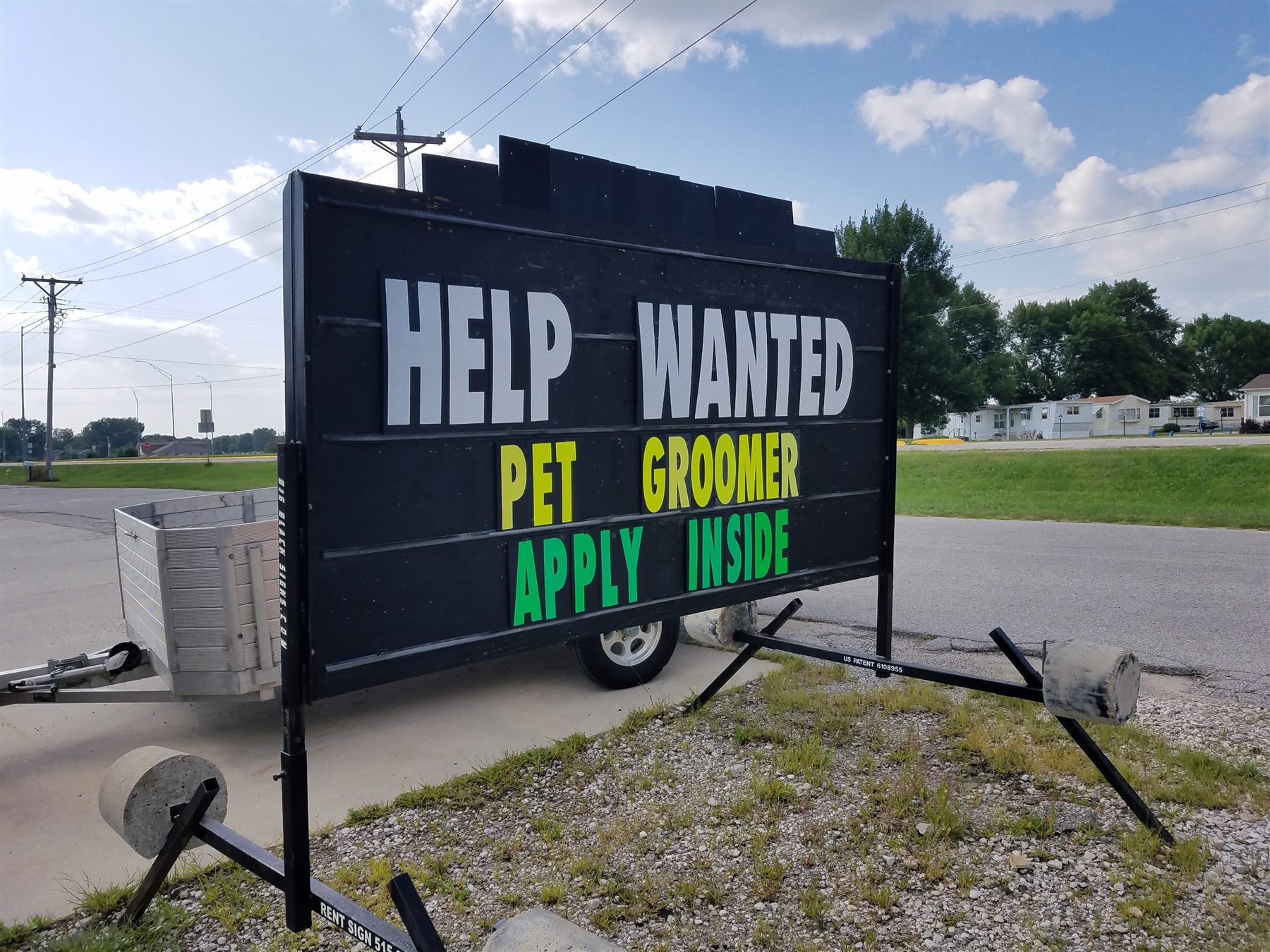 Help wanted pet groomer sign
