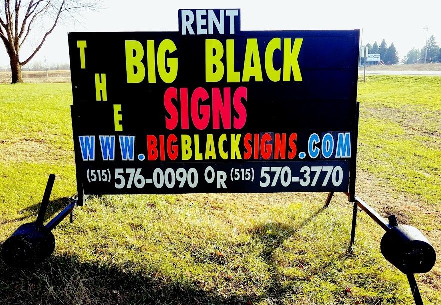 Big Black Signs rental board beside a roadway